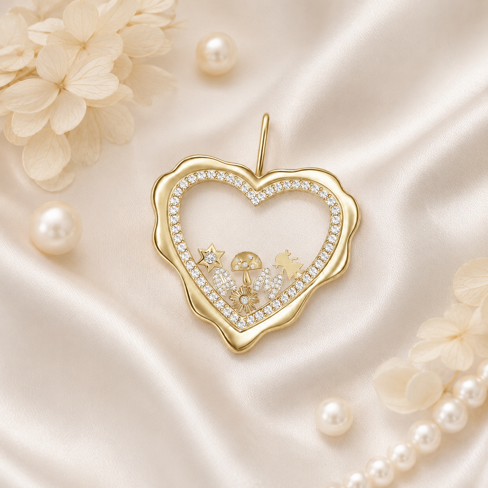Gold heart jewelry set on satin fabric